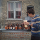 A friend helps pour out the remnants of Dark Gourd Day 2013.